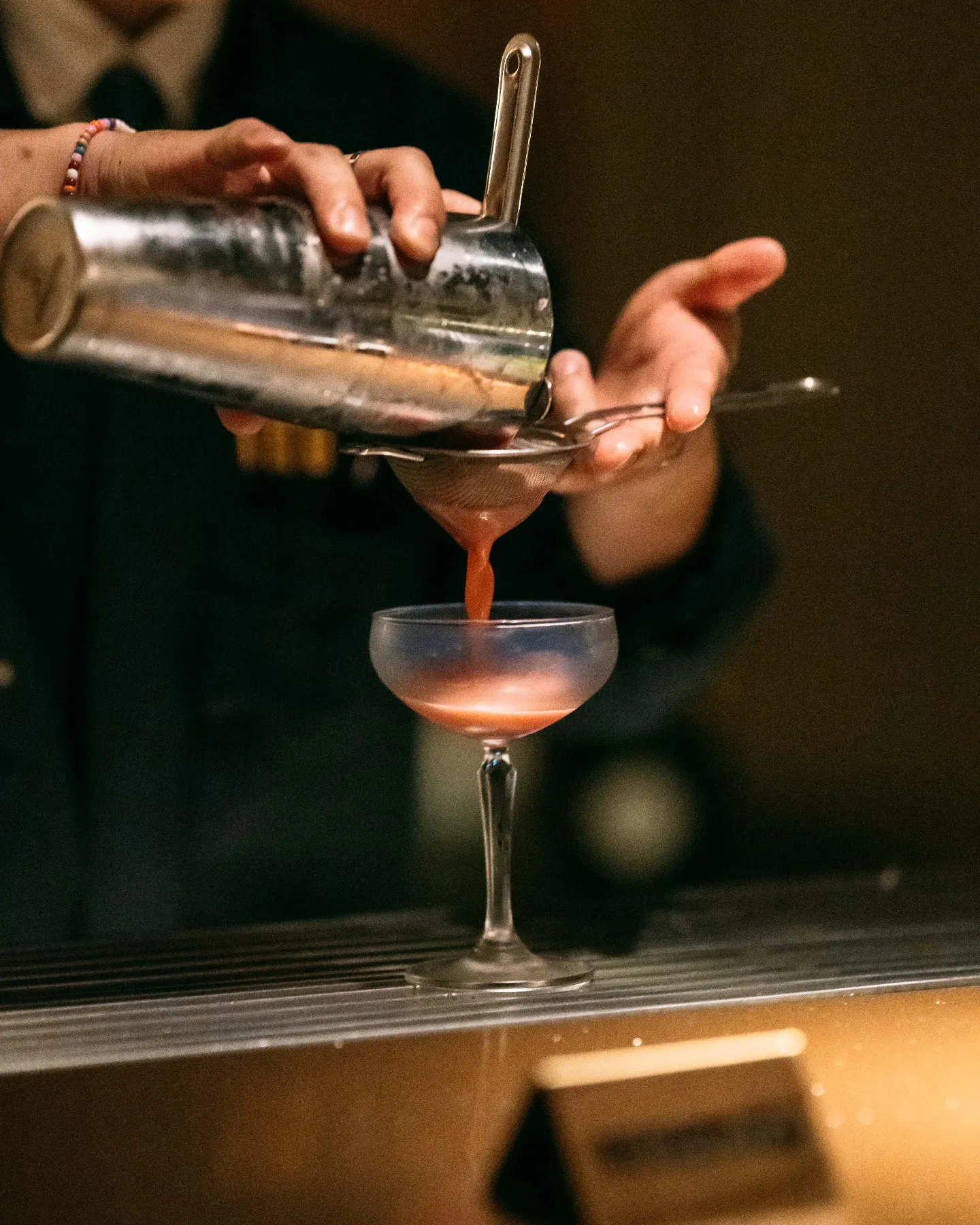 Find the Photo Booth-10-bartender-pouring-a-drink