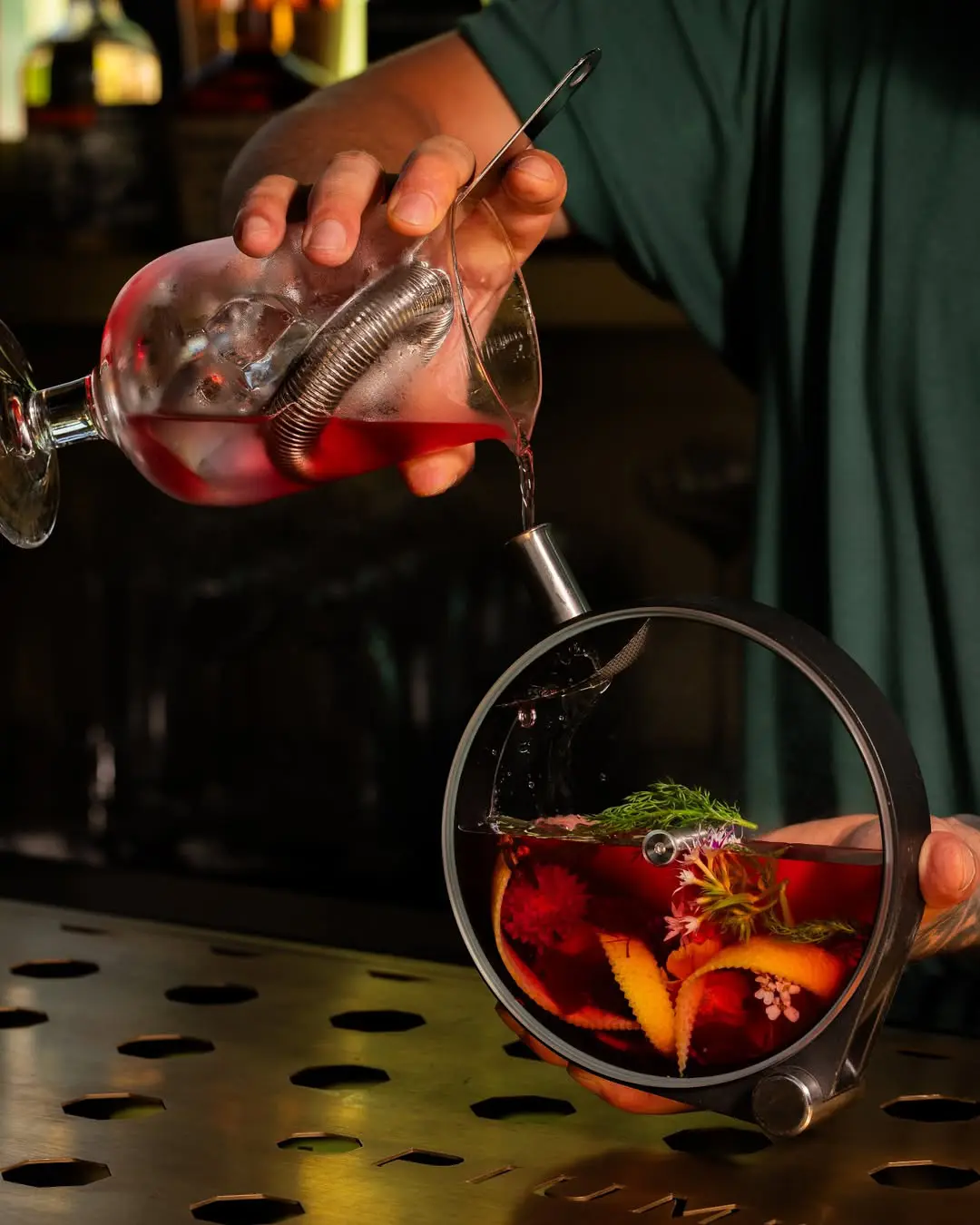 Opium-Bar-Bangkok-bartender-pouring-a-drink